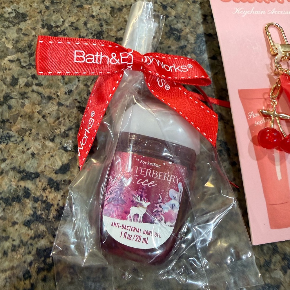 NWT. Bath & Body Works Winterberry Ice Hand Gel with Red Ribbon.